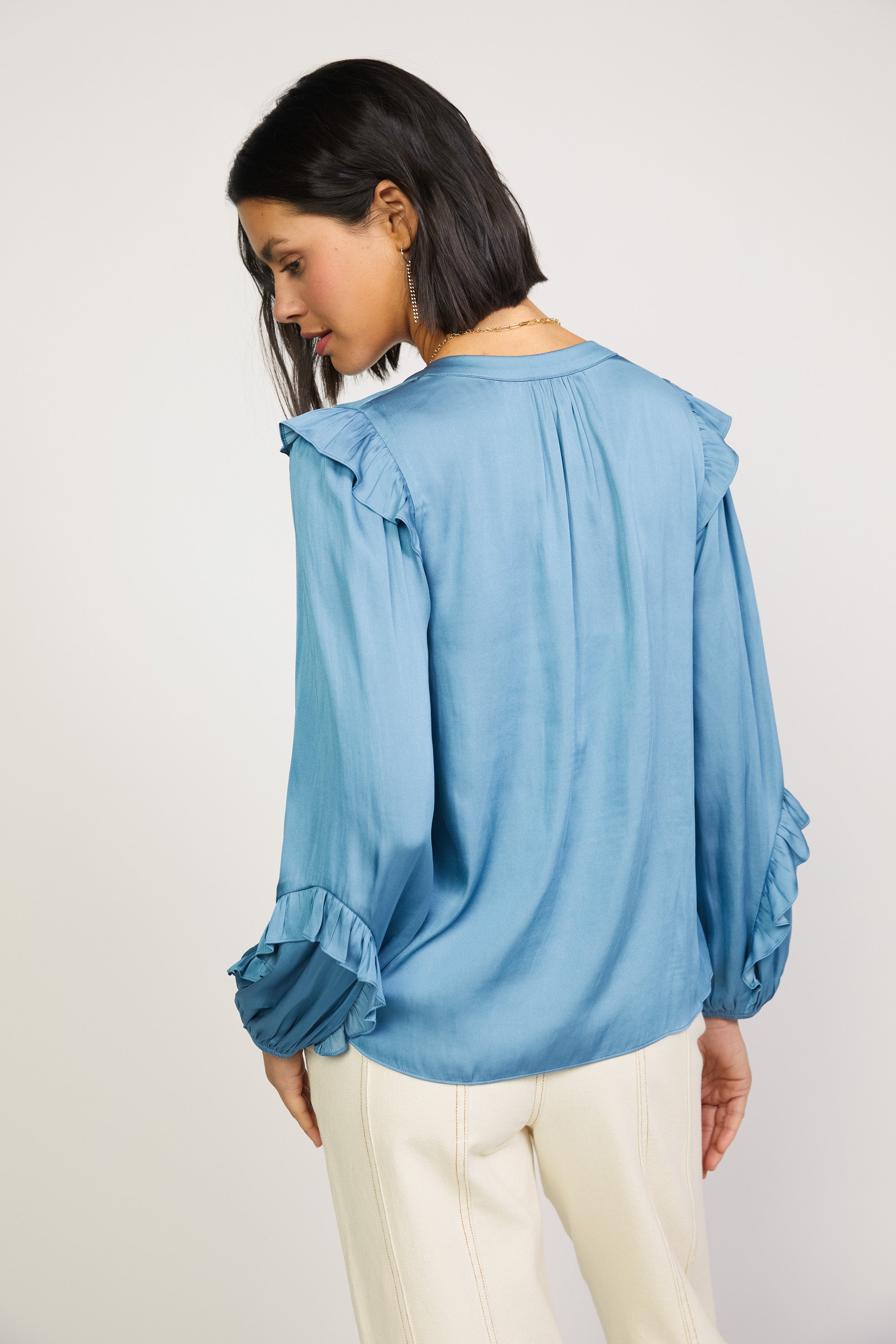 light blue ruffle blouse