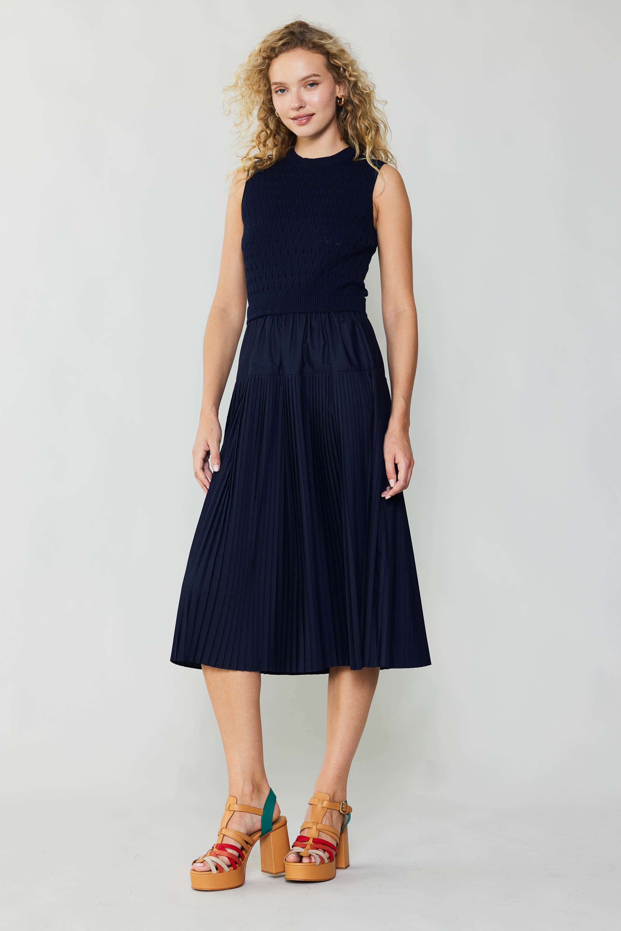 Sweater dress with outlet pleated skirt